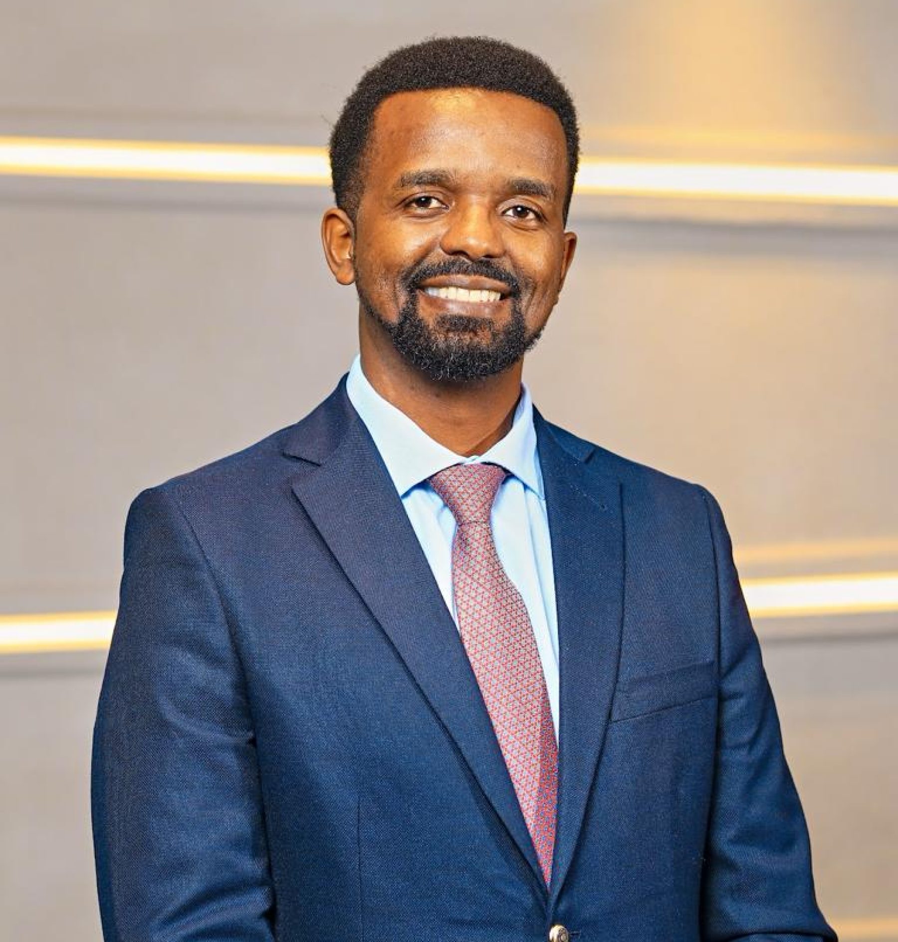 Dr. Joe Njagi in Professional Suit